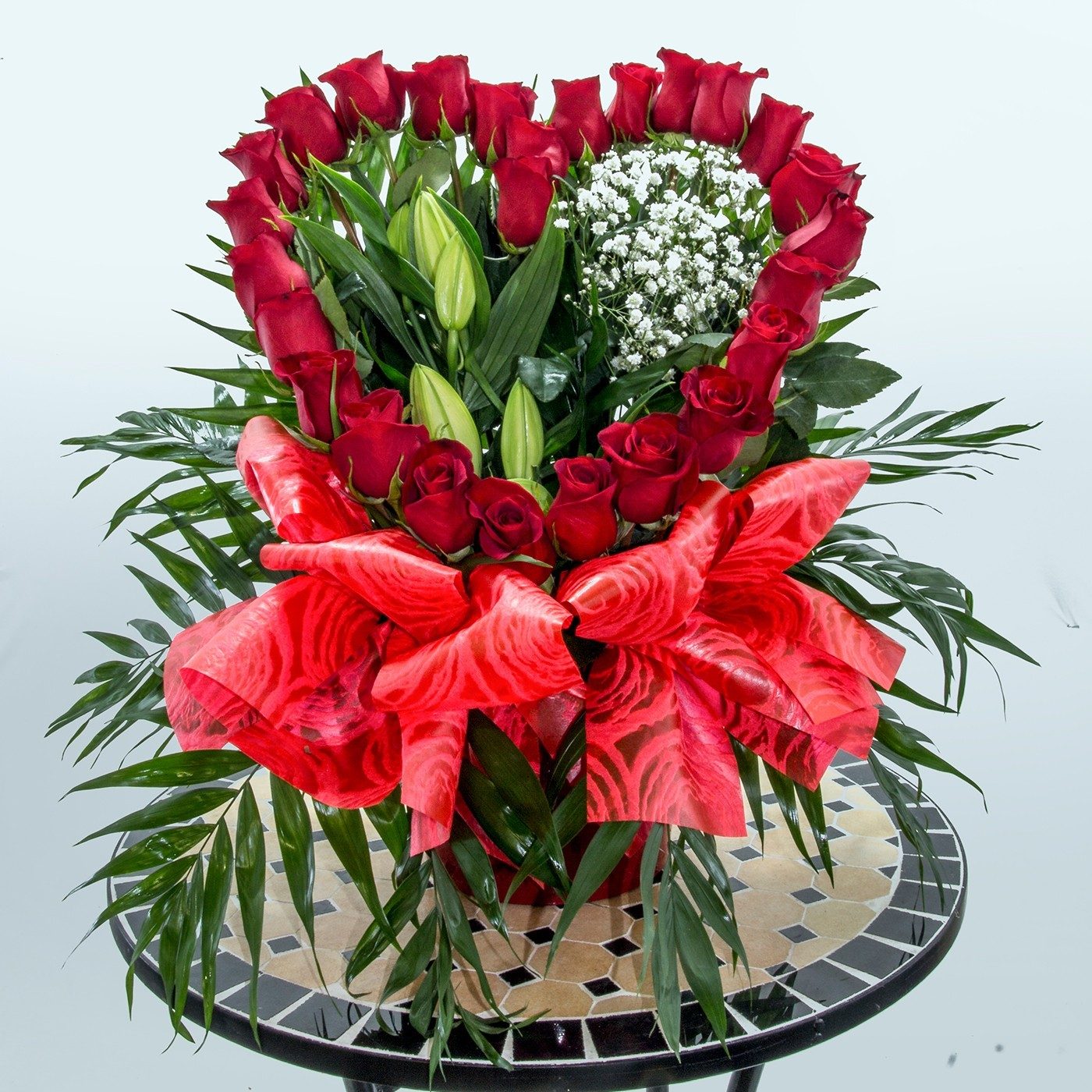 Comprar Centro de 25 rosas en forma corazón Barcelona